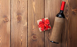 Red wine bottle and valentines day gift box
