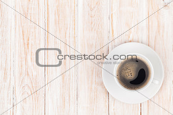 Coffee cup on white wooden table