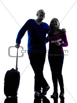 couple senior travelers traveling silhouette