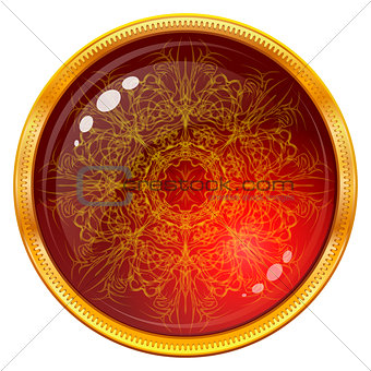 Golden button with patterned red gem