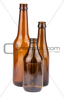 Three empty brown bottles