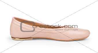beige low-heeled shoes on an isolated white background