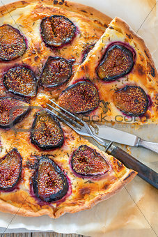 Pizza with figs and thyme. Top view.