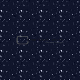 White snow falling on dark background