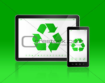Digital tablet PC with a recycling symbol on screen. ecological 