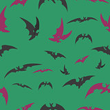 bats on a green background for Halloween.