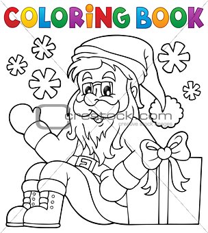 Coloring book with Santa Claus and gift