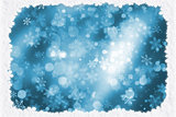 Christmas background of snowflakes and bokeh lights