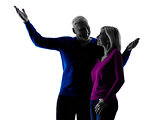 couple senior happy pointing silhouette