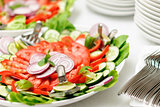 fresh vegetarian salad on the plate
