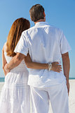 Man and Woman Couple Embracing on Beach