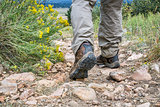 hiker feet on a mountain trail