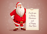 Merry Santa Claus standing with christmas greetings banner in arm