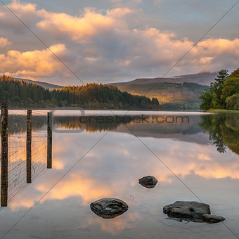 Reflections on Loch Ard, Scotland at sunrise