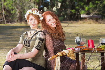 Pair of Smiling Pagan Women
