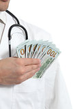 Doctor keeping money in his pocket