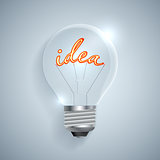Lightbulb with Idea sign on a light background