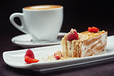 beautiful cake dessert with coffee cream and fresh berry