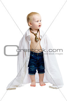 Little boy in a large shirt and tie