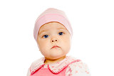 serious baby in a pink hat on a white background