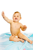 baby in diaper sitting on a blue blanket. Isolated