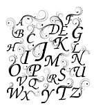 Vintage floral alphabet with curly design elements.