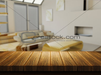 Wooden table with defocussed lounge image