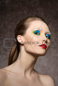 female with strange artistic make-up 