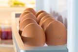 Open fridge filled with eggs