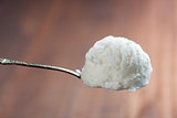 Vanilla ice cream on spoon