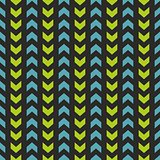 Tile vector pattern with blue and mint green zig zag print on black background