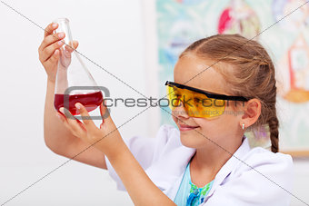 Young student in chemistry class