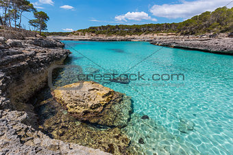 Turquoise waters of a bay in the Mondrago Natural Park, Mallorca