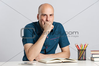 serious man on a desk