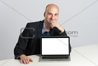 man showing laptop with blank screen