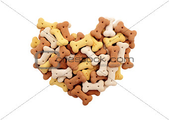 Mixed dried dog biscuits in a heart shape