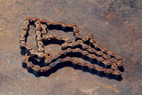 Rust chain on metal work bench