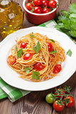 Spaghetti pasta with tomatoes and parsley