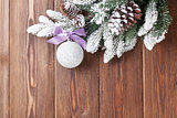 Christmas background with firtree and bauble