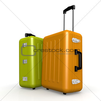 Orange and green luggages stand on the floor