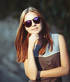 teenage girl in sunglasses.
