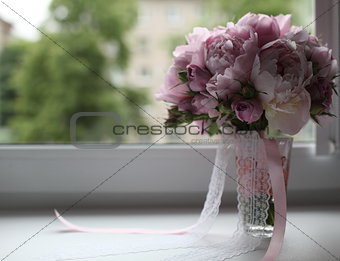 bridal bouquet on the window