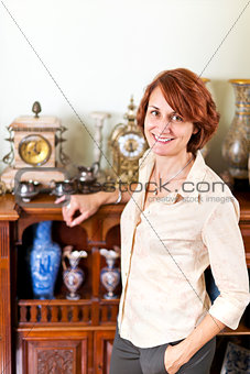 Woman with antique collection