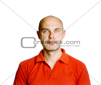 Unshaven tranquil middle-aged man in a red T-shirt. Studio. isol