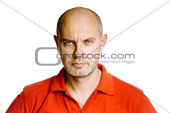 Unshaven fearsome middle-aged man in a red T-shirt. Studio. isol