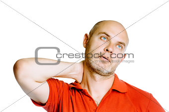 Unshaven middle-aged man holding his neck. Pain. Studio. isolate