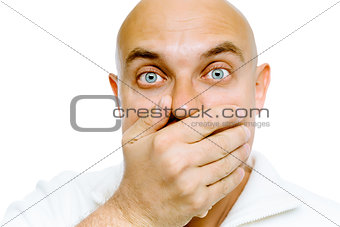 Bald frightened man in a white jacket covers her mouth with his 