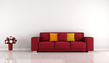 Minimalist living room with red sofa