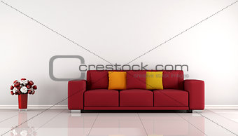 Minimalist living room with red sofa