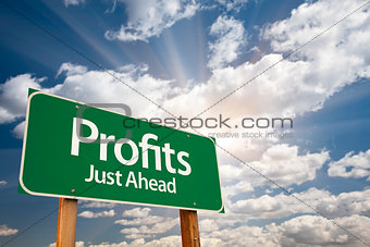 Profits Green Road Sign Over Clouds